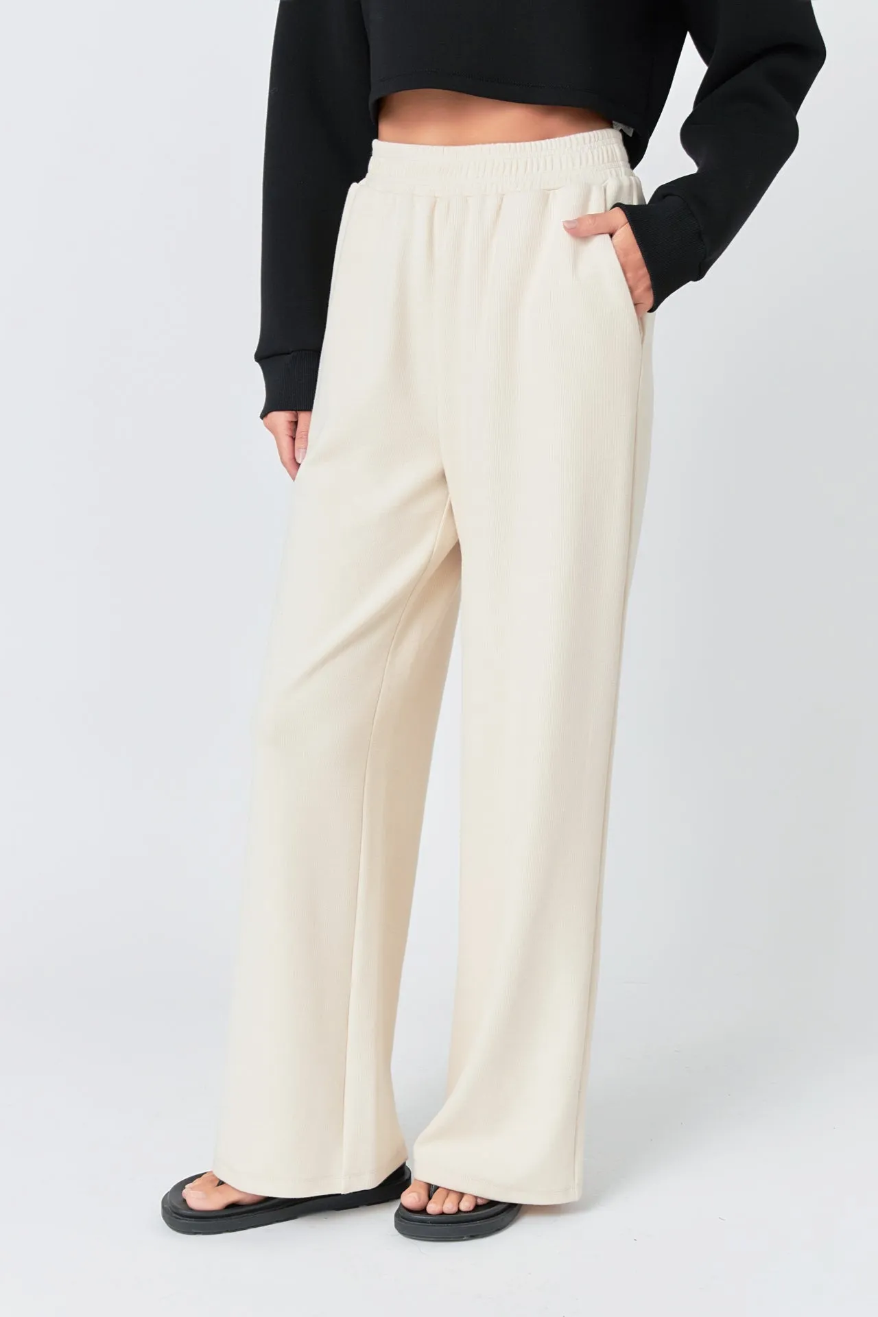 Sure! Heres an optimized title for the product:

Womens High-Waist Wide-Leg Knit Lounge Pants

This version includes modifiers such as womens, high-waist, and lounge, to make the title more descriptive and appealing for potential buyers.