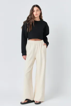 Sure! Heres an optimized title for the product:

Womens High-Waist Wide-Leg Knit Lounge Pants

This version includes modifiers such as womens, high-waist, and lounge, to make the title more descriptive and appealing for potential buyers.