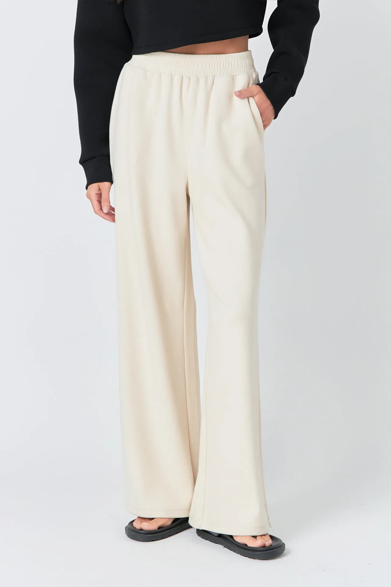 Sure! Heres an optimized title for the product:

Womens High-Waist Wide-Leg Knit Lounge Pants

This version includes modifiers such as womens, high-waist, and lounge, to make the title more descriptive and appealing for potential buyers.