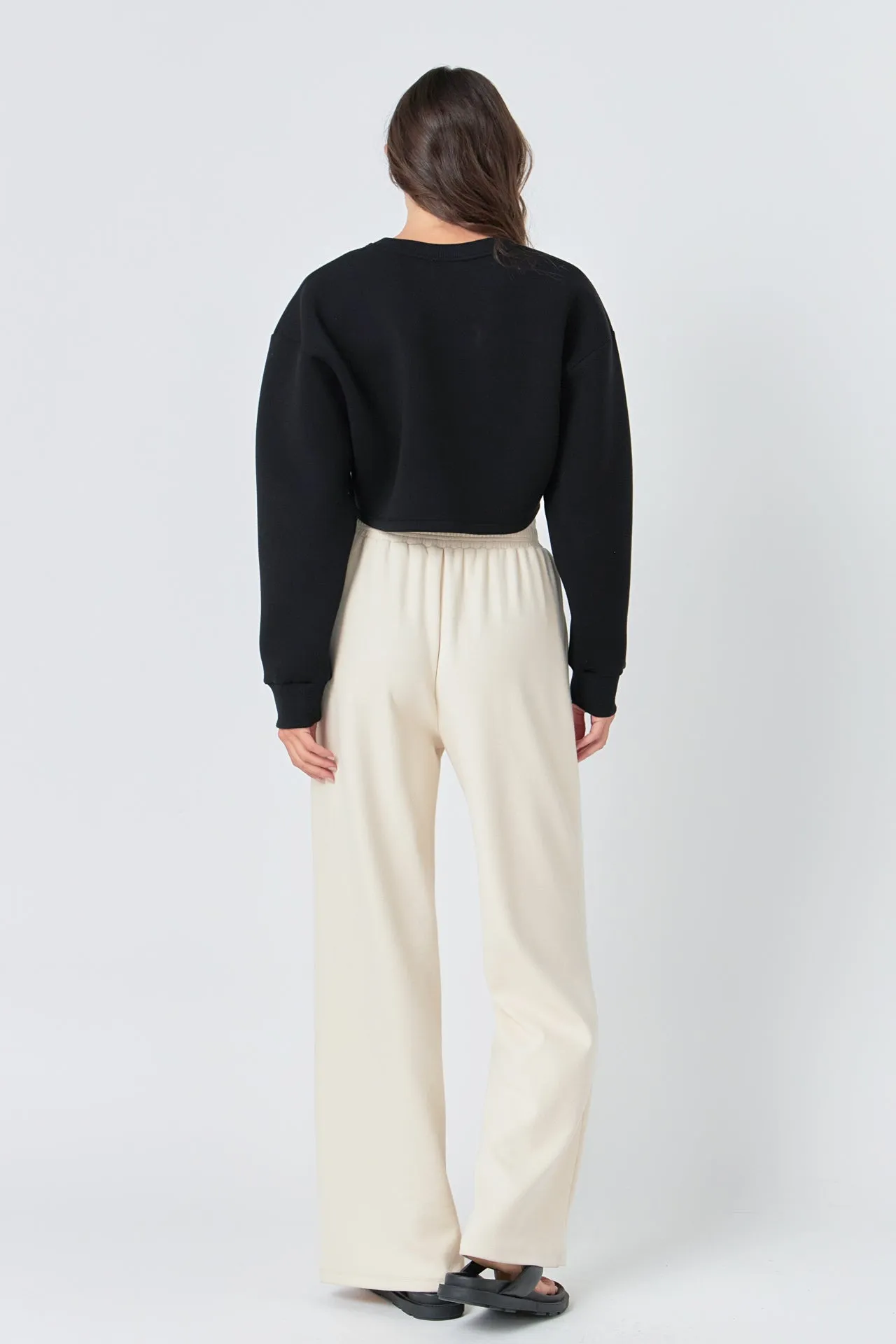 Sure! Heres an optimized title for the product:

Womens High-Waist Wide-Leg Knit Lounge Pants

This version includes modifiers such as womens, high-waist, and lounge, to make the title more descriptive and appealing for potential buyers.